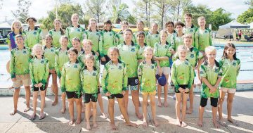 Young swimming star sets a new FNQ record