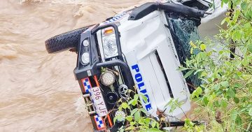 Police officer in strife after floodwater mishap