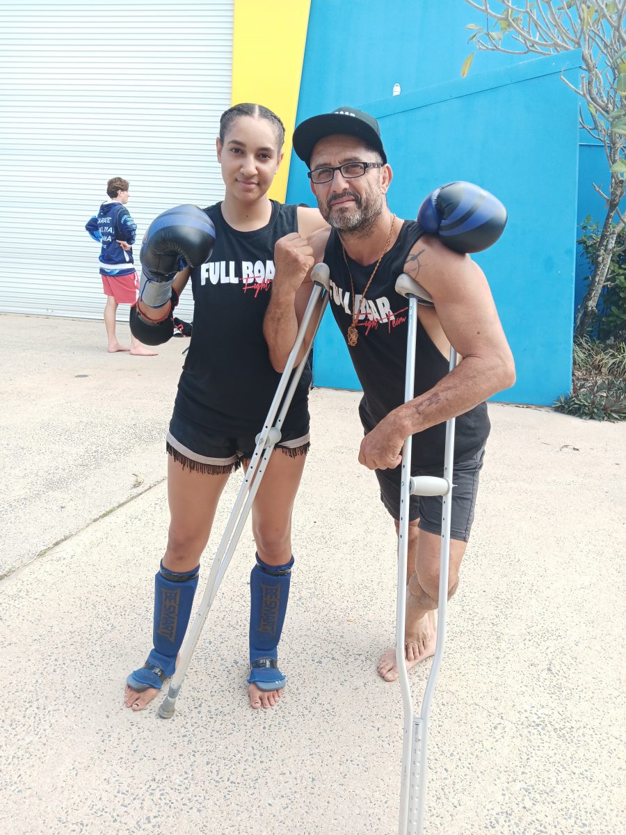 Ferlene David with Full Boar Gym coach Vince Parkes at her comeback fight in Cairns.