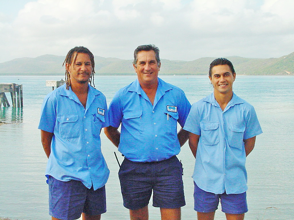Clarky, centre, with Charles David and Edwin Turner during his PCQ days in the Torres Strait.