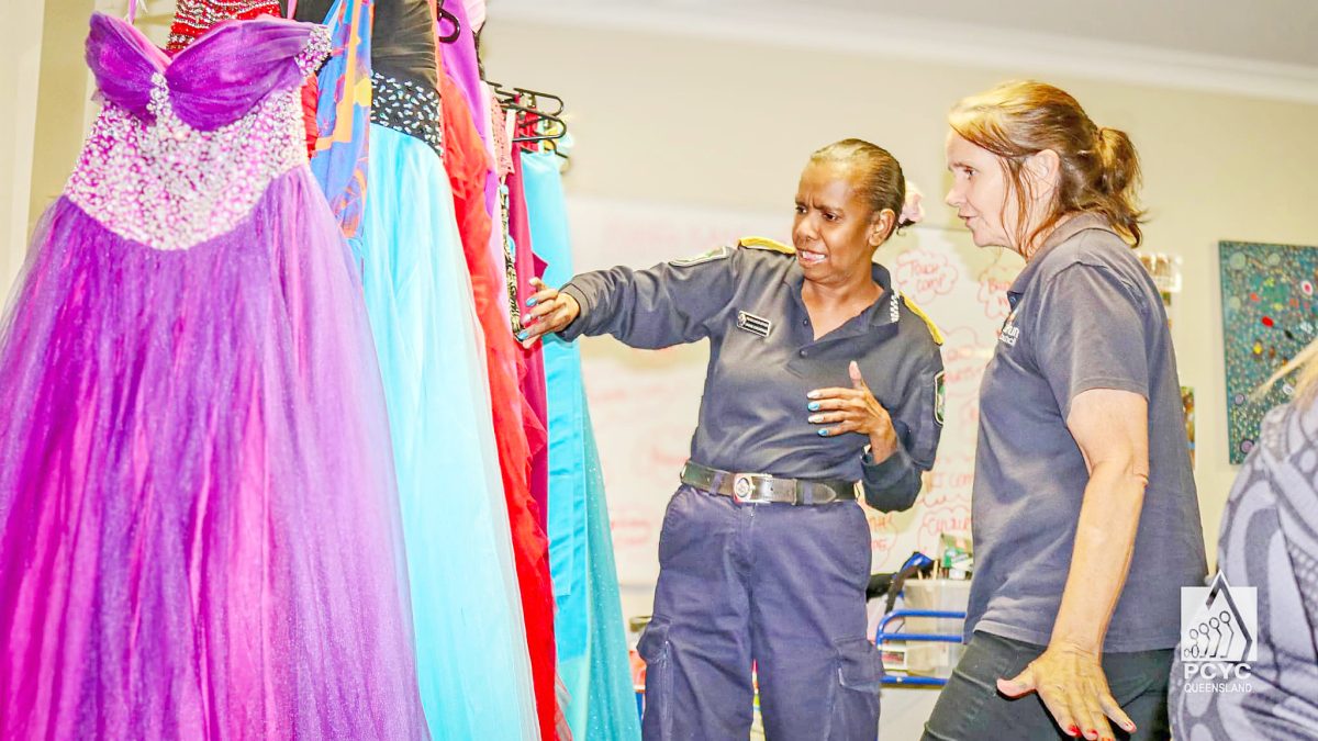 Picking out a dress for the PCYC Aurukun-organised Youth NAIDOC Ball.