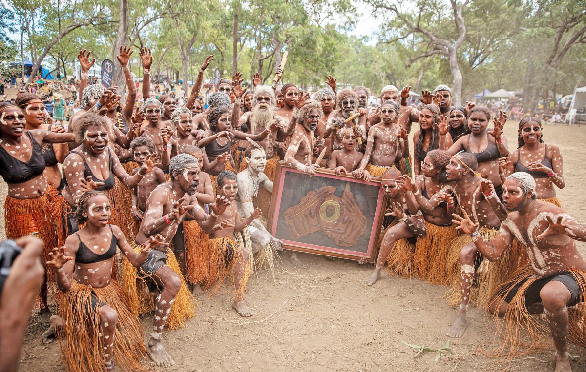 The Pormpuraaw traditional dance group Kutubi Gura Buna celebrate with the shield after being announced as the winners of the Laura Quinkan Dance Festival.