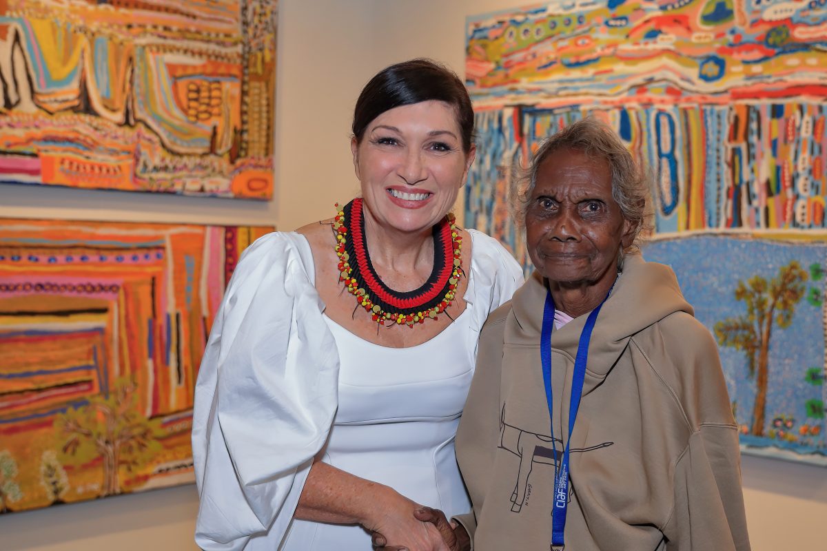 Arts Minister Leeanne Enoch presented Aurukun's Janet Koongotema with the Premier's Choice Award at CIAF. Photo: Paul Furse Frontrow Foto