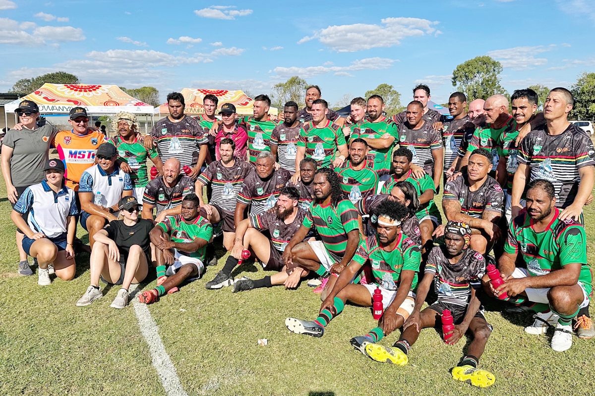 Kowanyama locals joined with the visiting retired league legends for an exhibition match on Saturday.