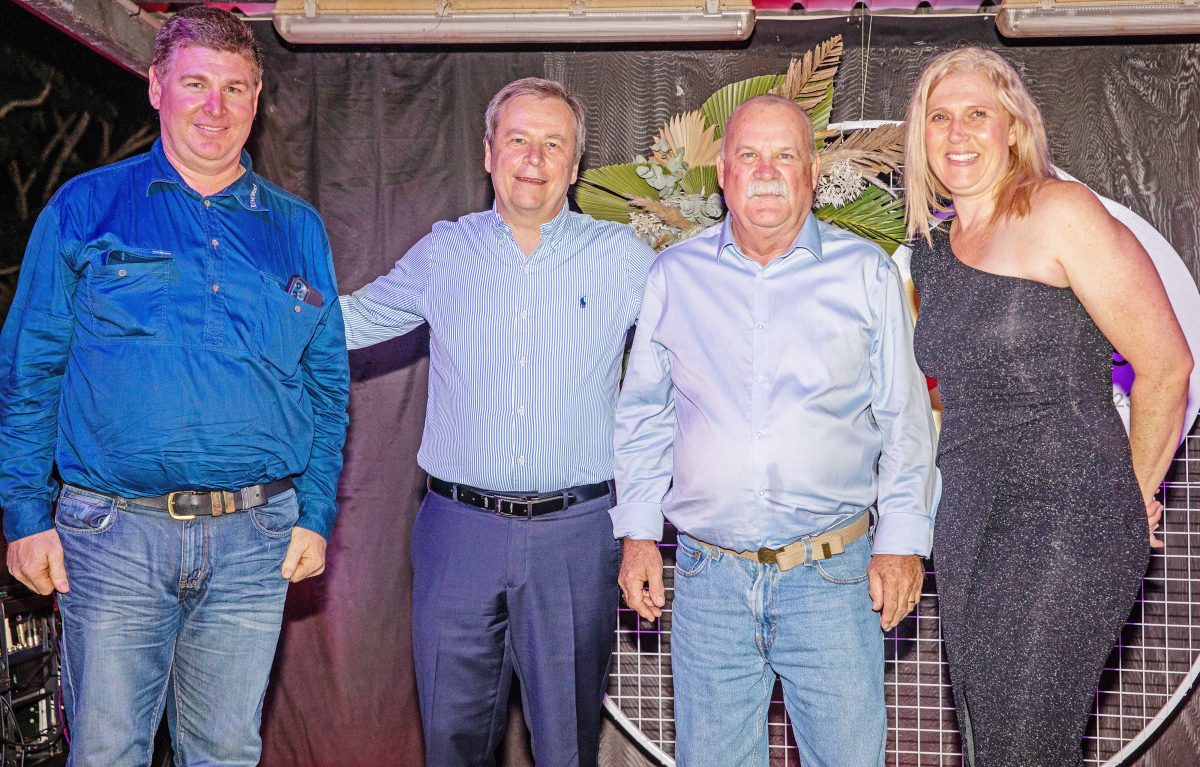 Ian Russ (second from right) is congratulated on 40 years of service by his superintendent Terry Watterson, Rio Tinto Aluminium Pacific boss Armando Torres and Rio Tinto Weipa general manager Shona Markham.