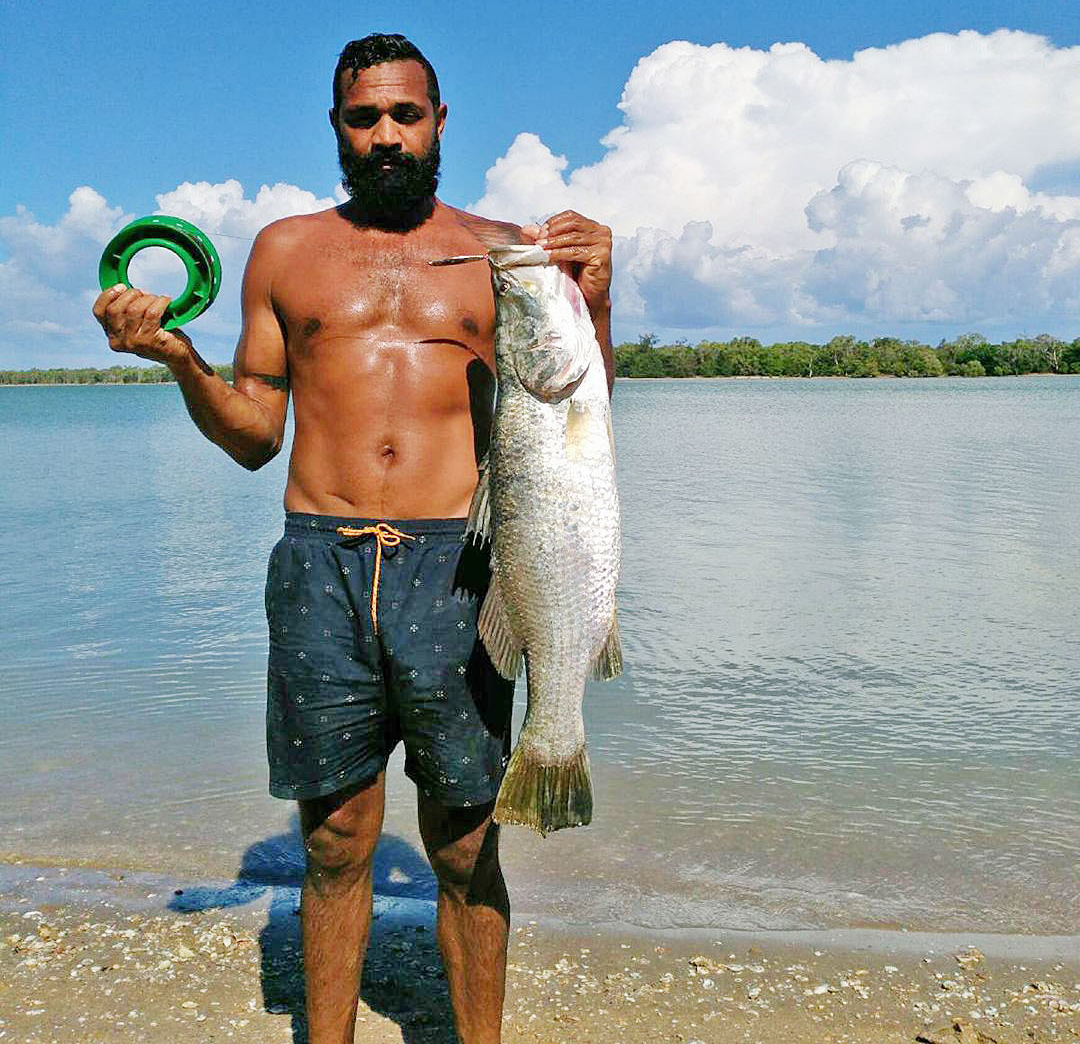 Catching barramundi on a hand line was one of his many talents.