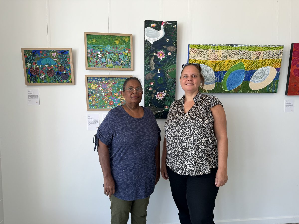 Dorothy Edwards and Lisa Michl Ko-manggén with the artworks