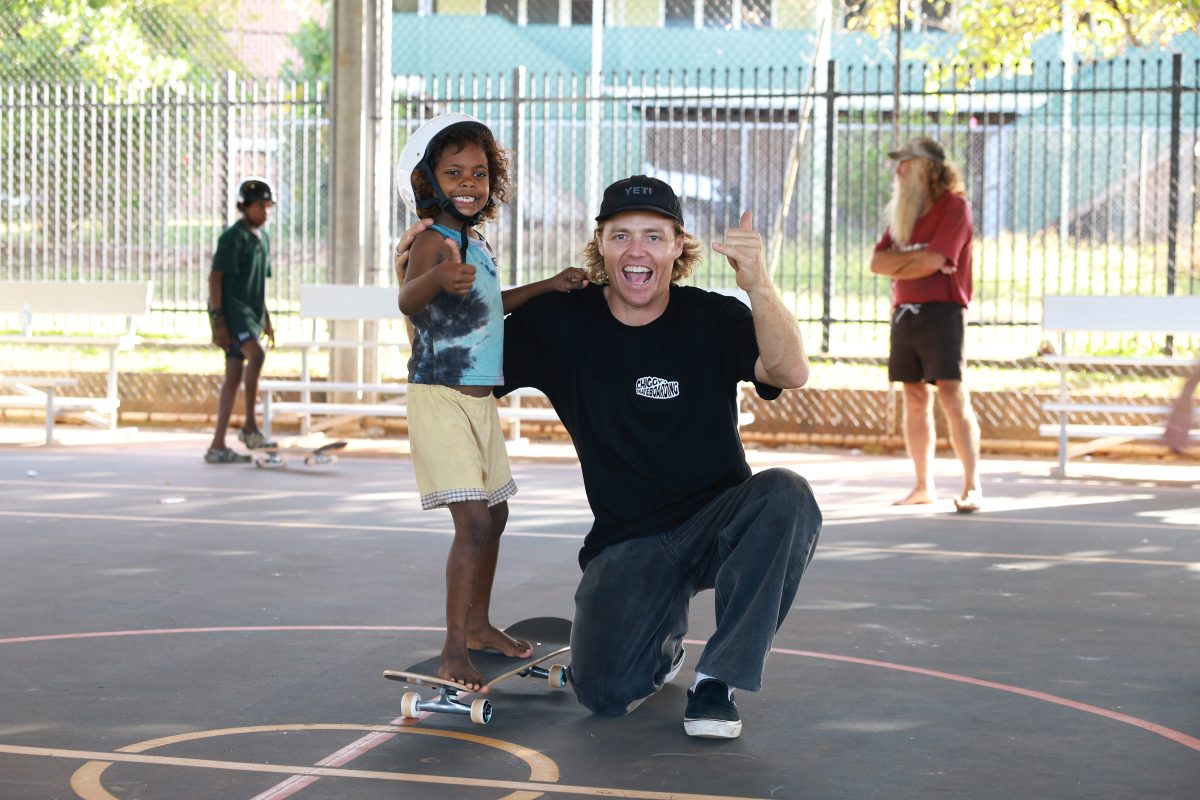 Mat Chigwidden and skateboarding workshop participant