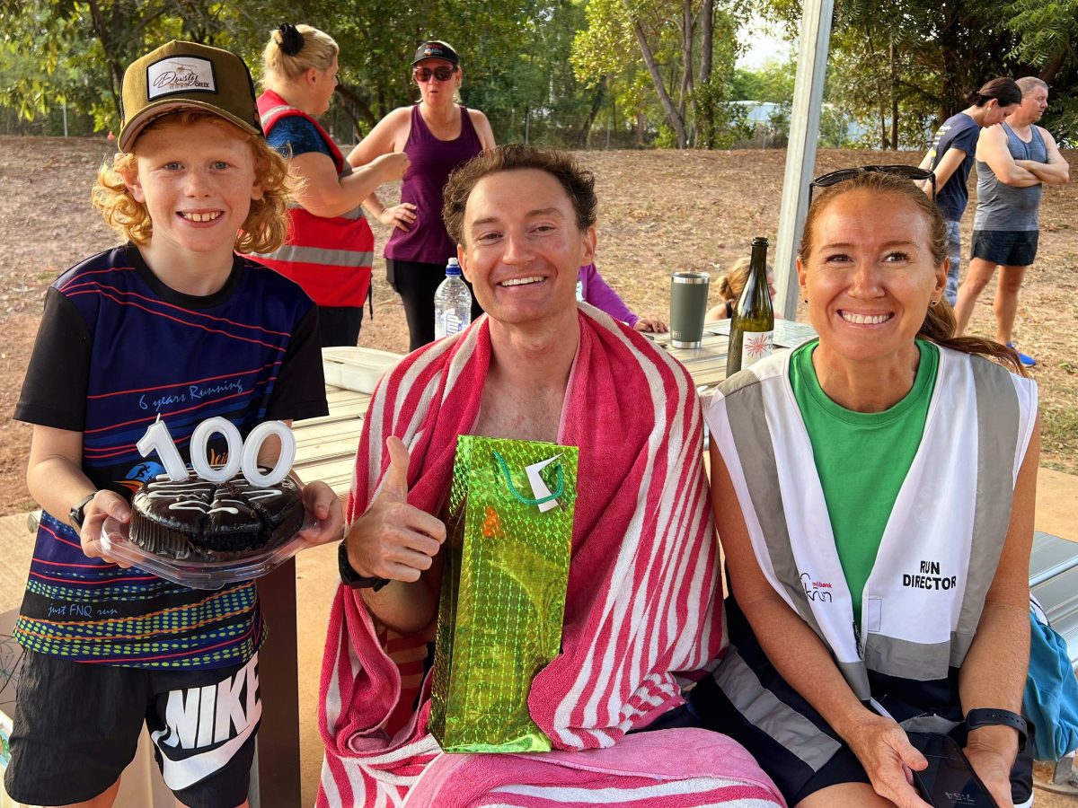 Michael Collins with Parkrun directors Zigmund Freiberg and mother Vide Freiberg