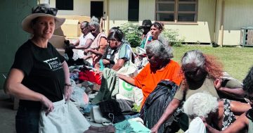 Charity visit a hit as Wujal Wujal residents spruce up wardrobes