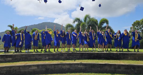 Graduation caps fly high as year 12s say goodbye