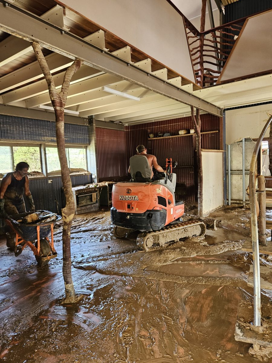 Cleaning out mud on the house