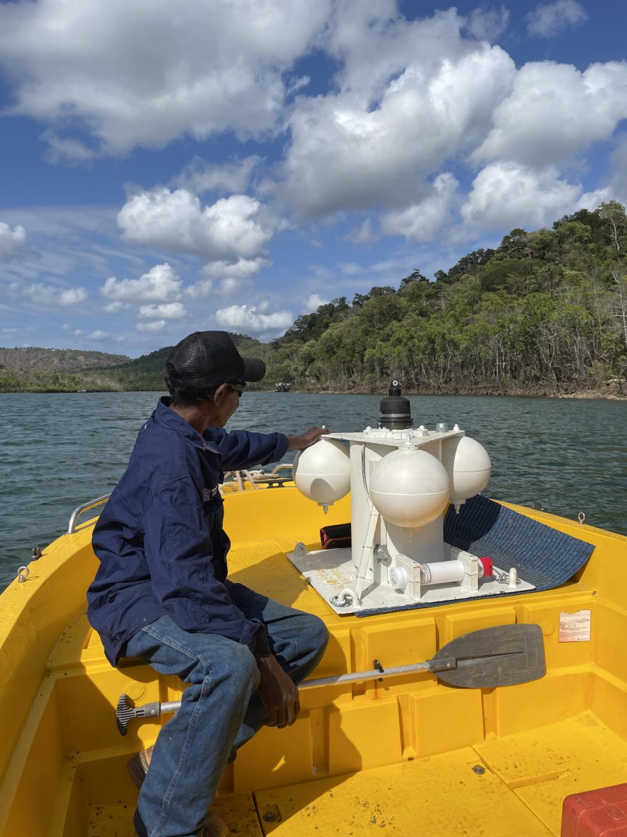 Senior Ranger Barry Olbar prepares to drop the tidal-analysis buoy in the Bloomfield River