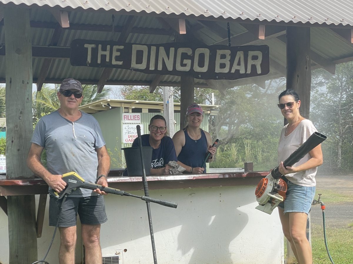Cooktown State School P&C team clean up the Cooktown Racecourse ahead of music bingo night