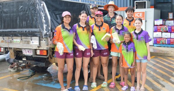 Cooktown swimmers dive into car washing mode for teammate