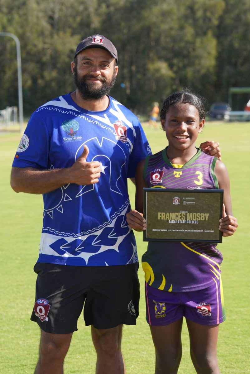 AFL Cape York region coordinator Kieran Sciberras gives Frances Mosby the thumbs up.