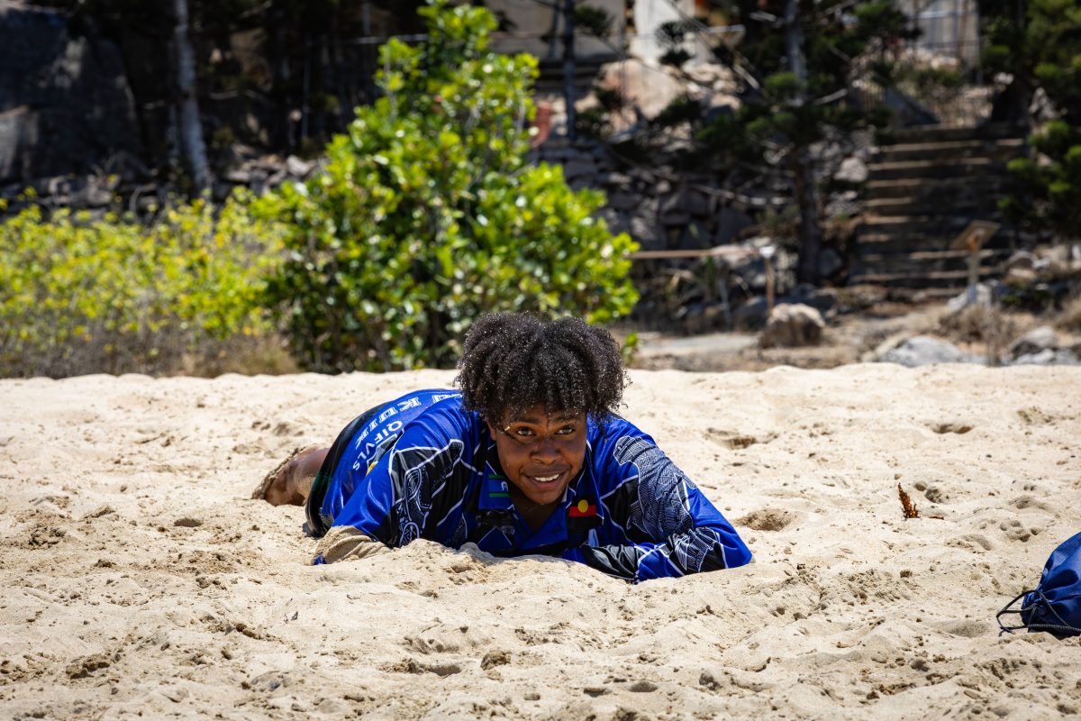 Flag racer on the beach.