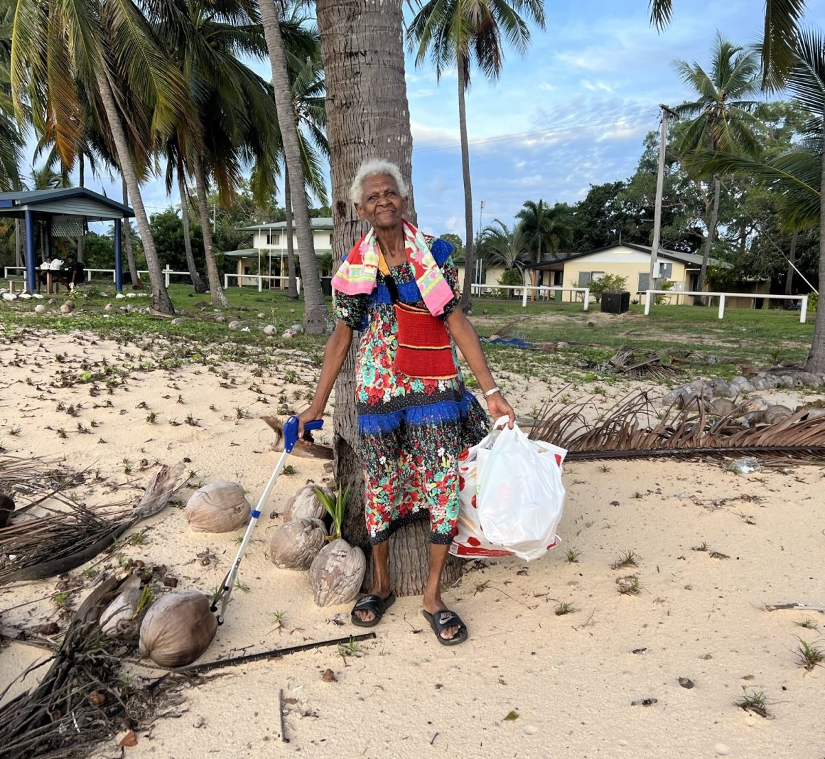 Seisia resident Eunice Sagaukaz cleans up her beach.