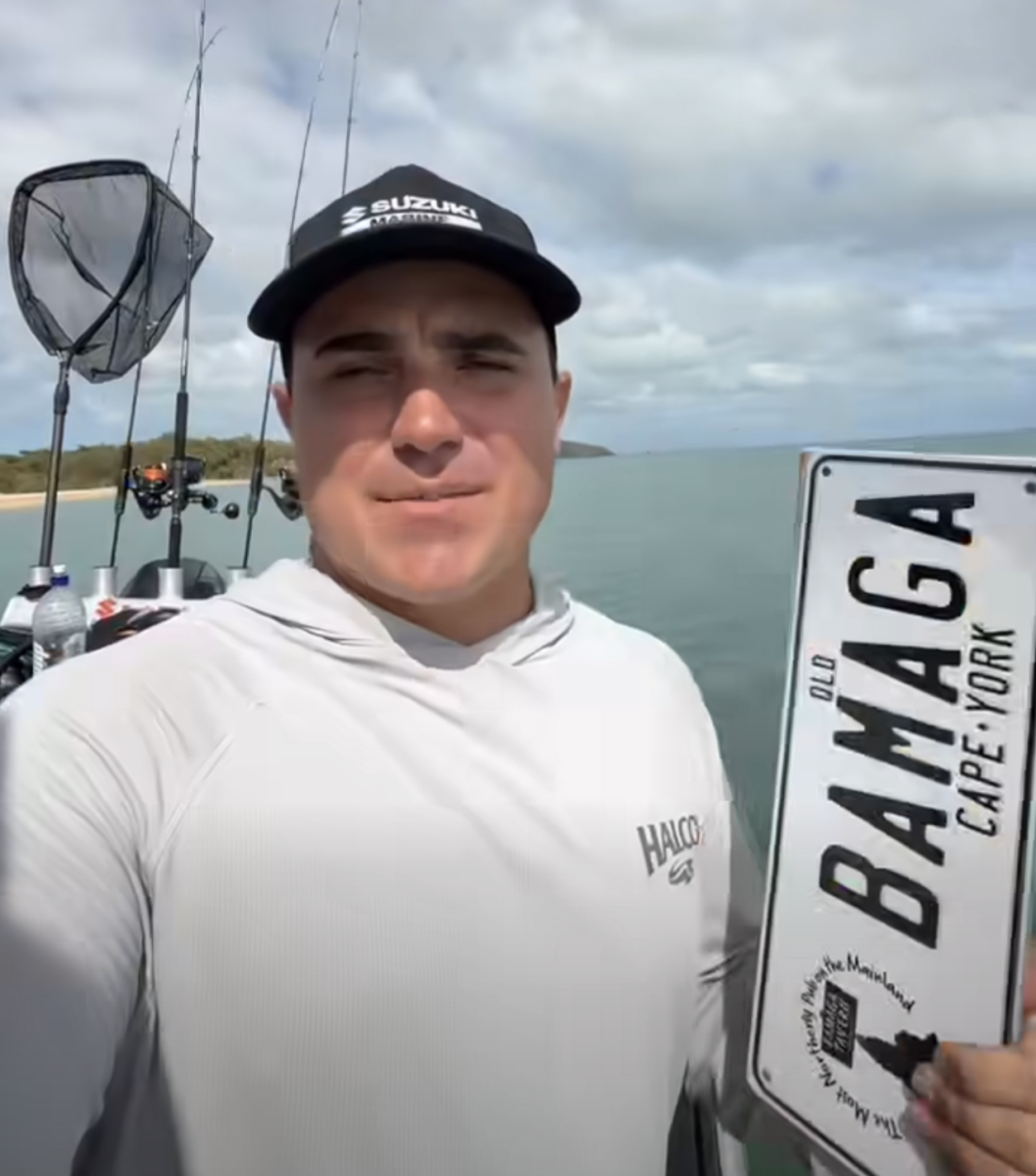 Jamie Vogler holds up the Bamaga number plate.
