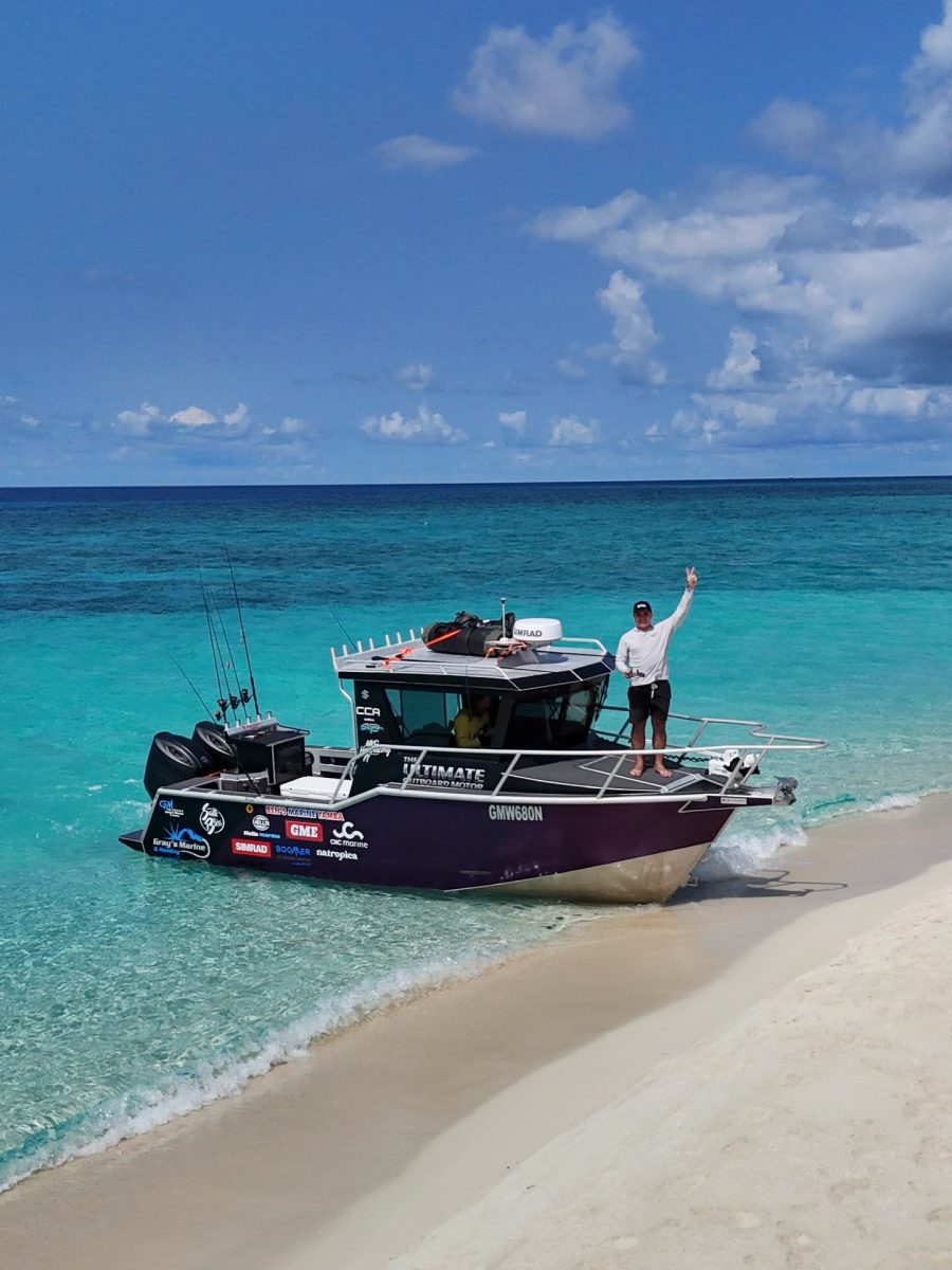 Jamie Vogler waves goodbye from his vessel.