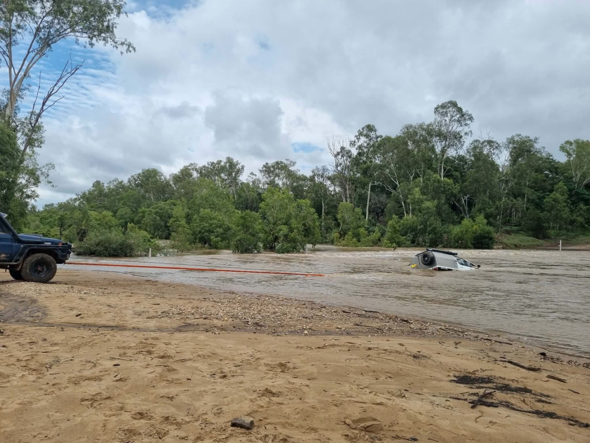 Vehicle being recovered from floodwater
