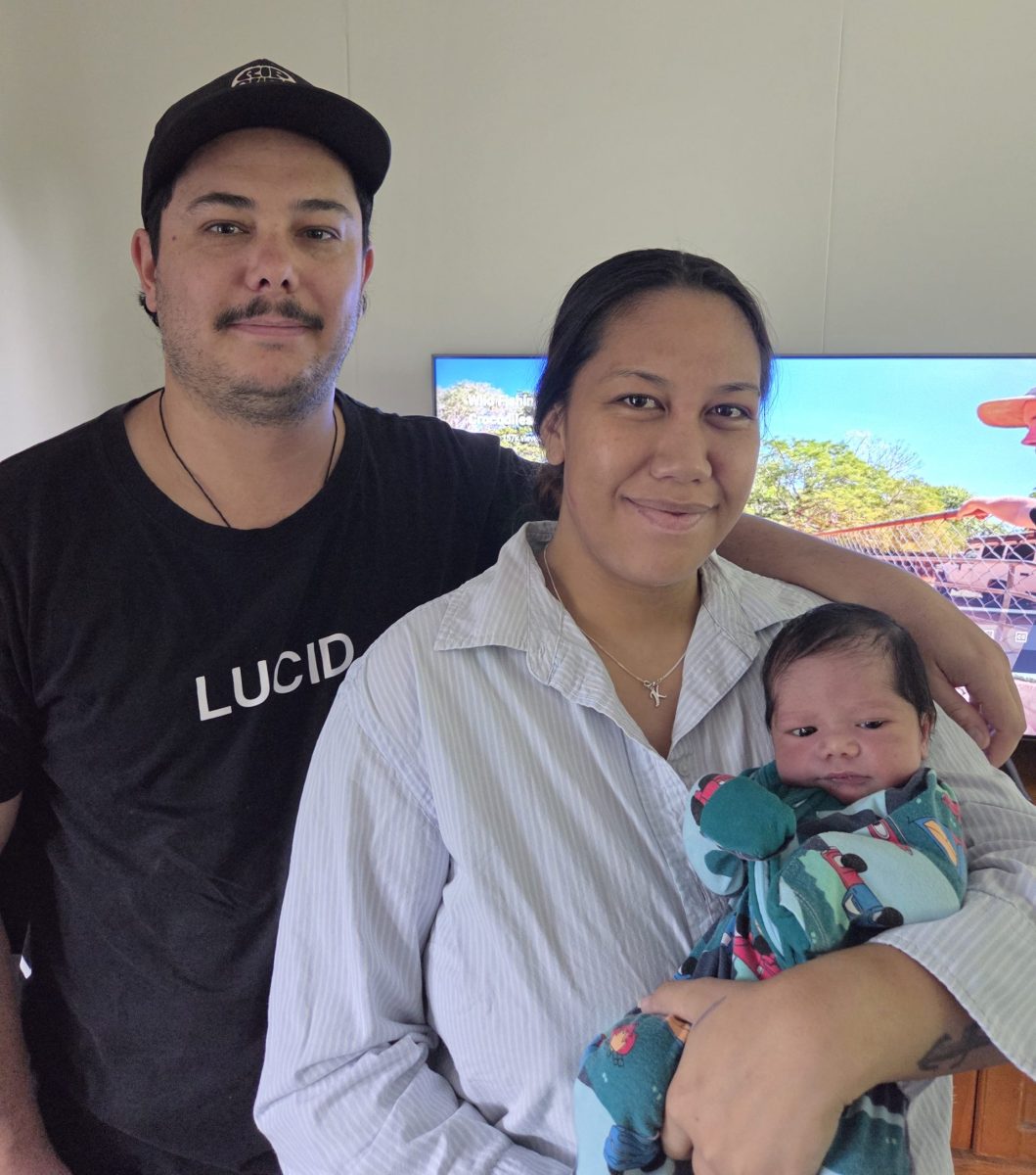Kahn Atutahi and Mathew Johnston with son Finn