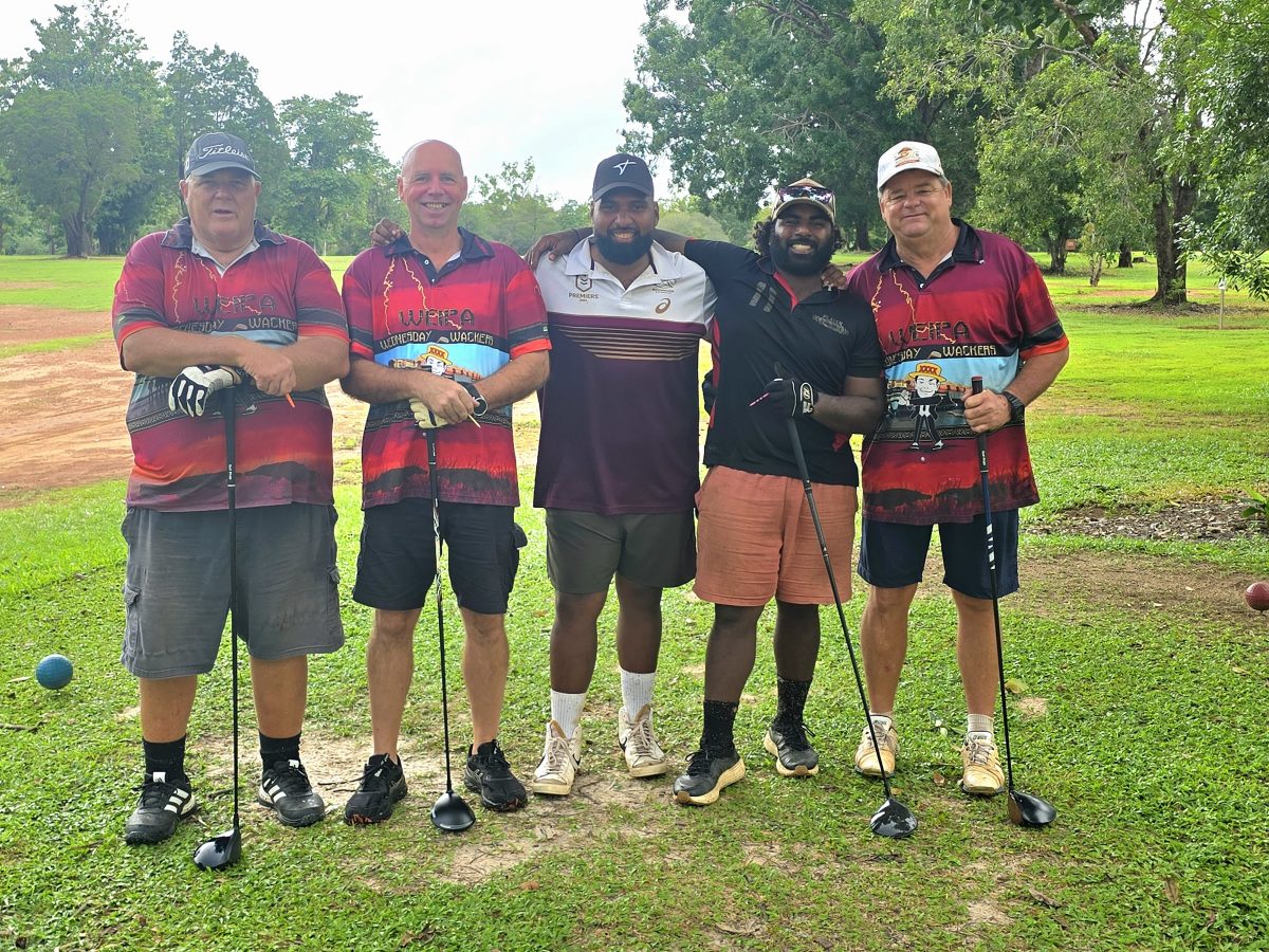 Grant Crossley, Eddy Tiemens, Hari Ginate, Paiwan Lui and Jim "Did Anyone See Where My Ball Landed?" Lucas take time out for a photo between intermittent rain at Wackers in Weipa on 11 February